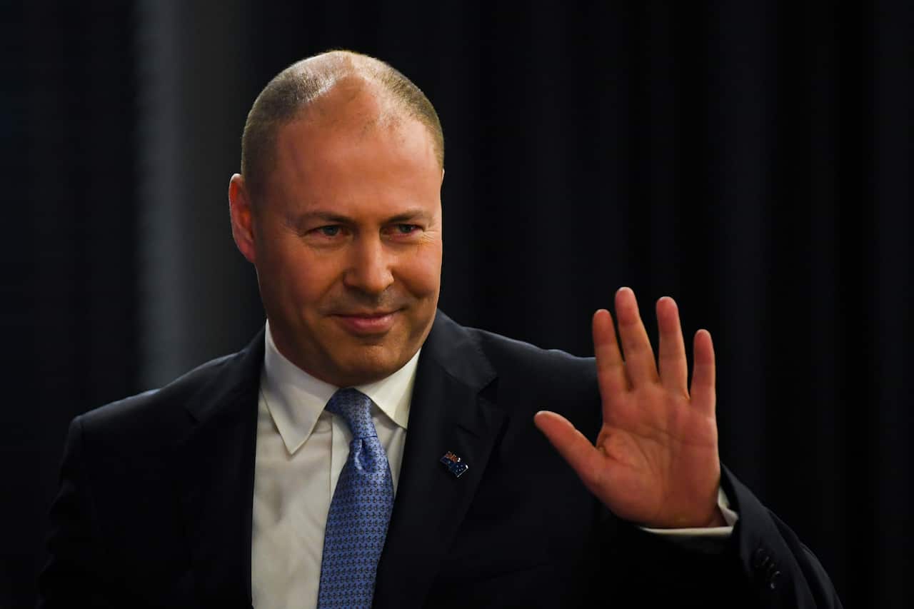 Treasurer Josh Frydenberg reacts ahead of delivering a 2020 Post-Budget Address to the National Press Club in Canberra, Wednesday, October 7, 2020. (AAP Image/Lukas Coch) NO ARCHIVING