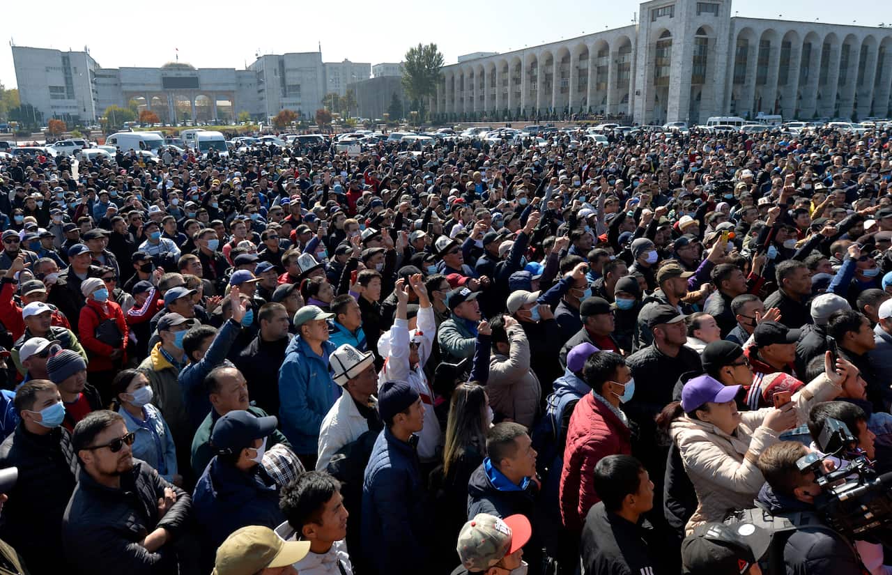 People protest during a rally on the central square in Bishkek, Kyrgyzstan on 7 October. 
