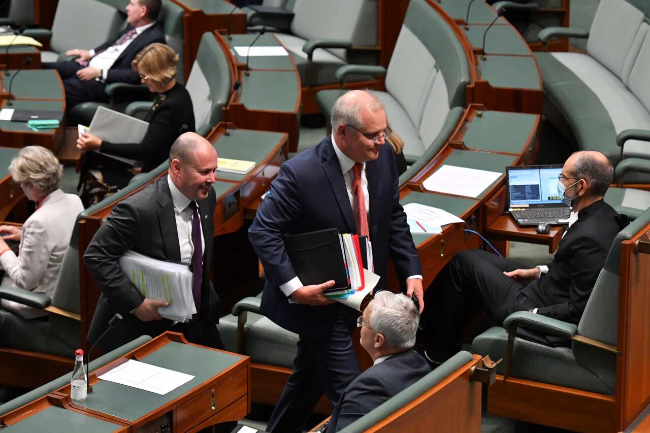 Treasurer Josh Frydenberg and Prime Minister Scott Morrison leave after Question Time in the House of Representatives at Parliament House in Canberra, Thursday, October 8, 2020. (AAP Image/Mick Tsikas) NO ARCHIVING