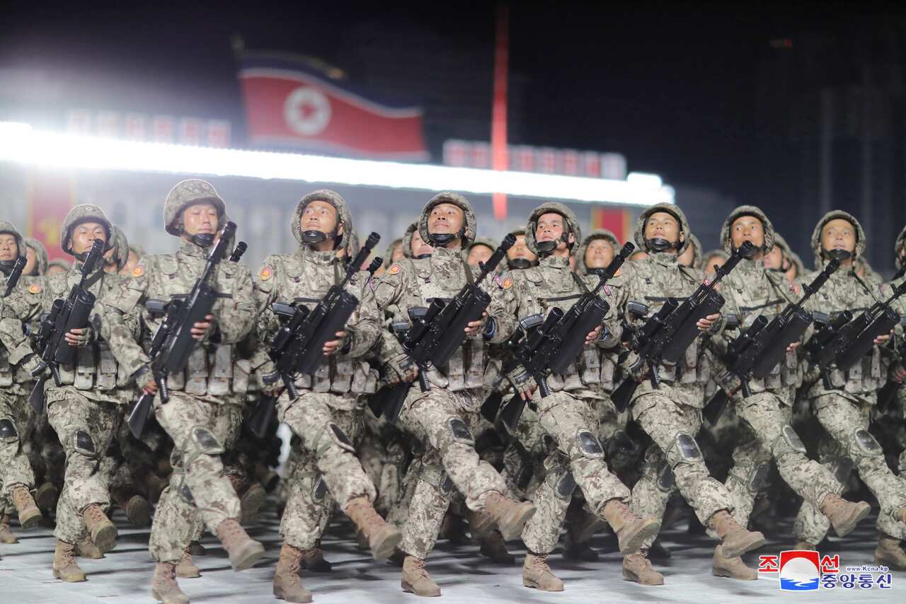 A photo released by the official North Korean Central News Agency shows North Korean soldiers during a military parade at Kim Il Sung Square in Pyongyang.