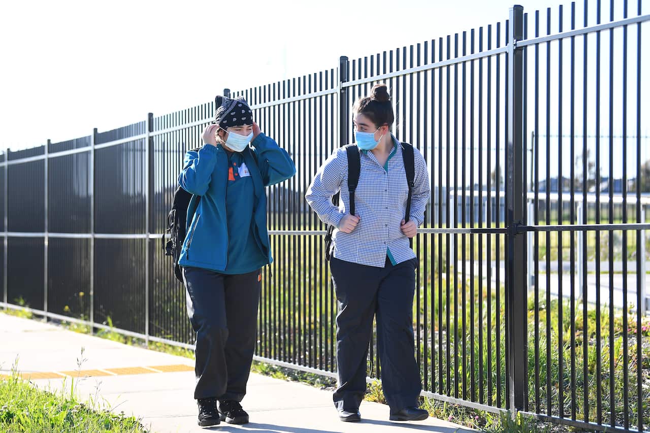 Year seven students arrive to Elevation Secondary College in Craigieburn, Melbourne, in October.