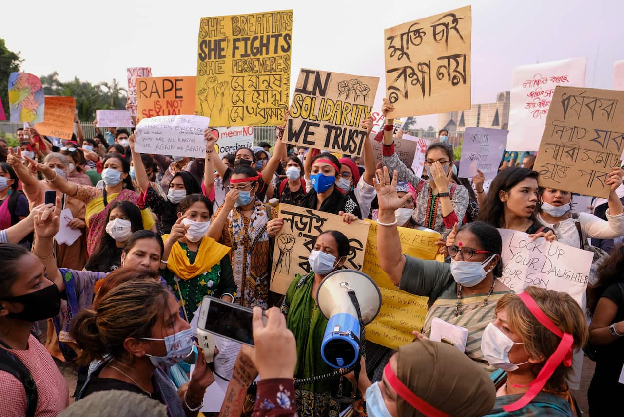 Women protest against gender-based violence outside the parliament in Dhaka, Bangladesh, on 9 October.