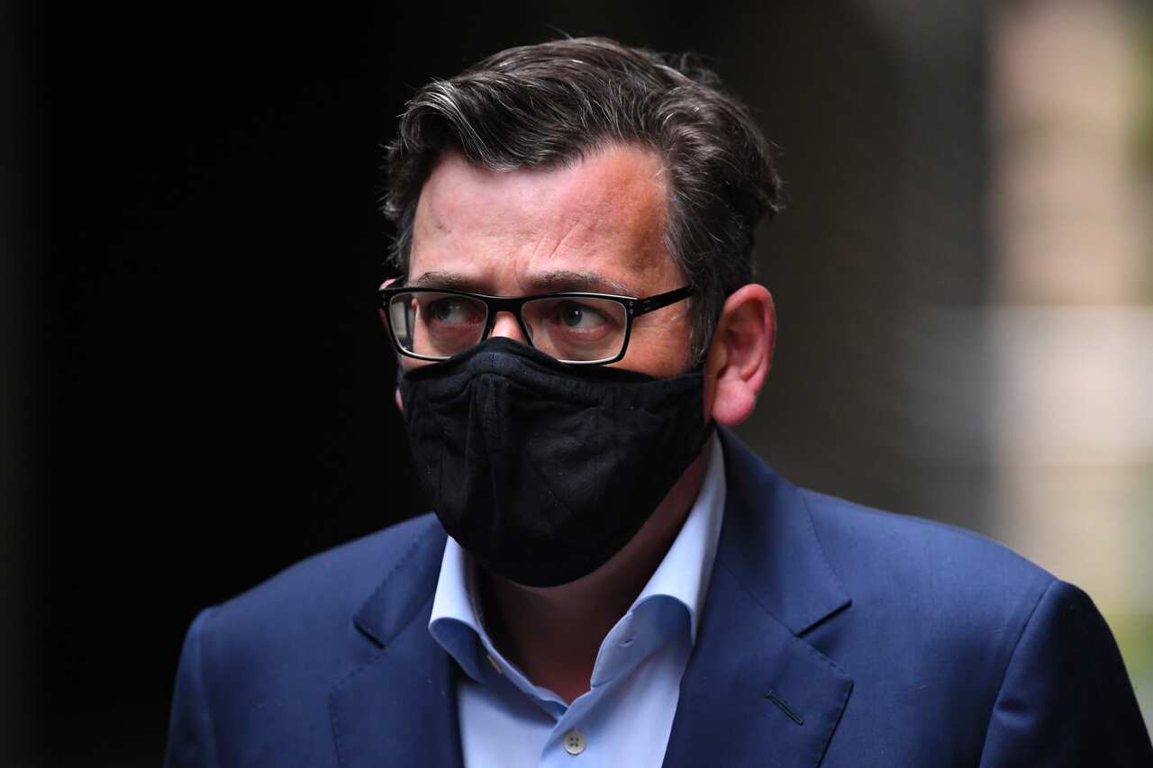 Victorian Premier Daniel Andrews arrives at a press conference in Melbourne on Tuesday.