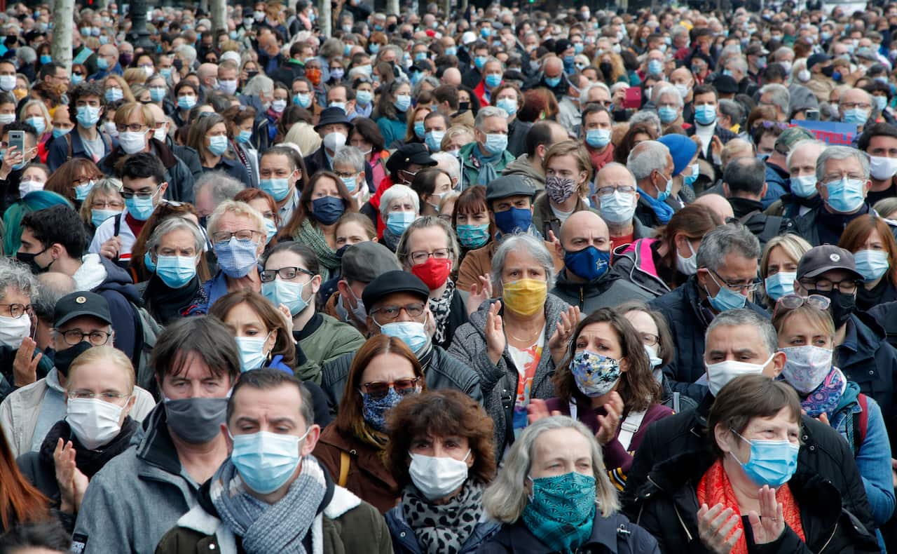 People gather during a demonstration on Sunday, 18 October, 2020 in Paris.