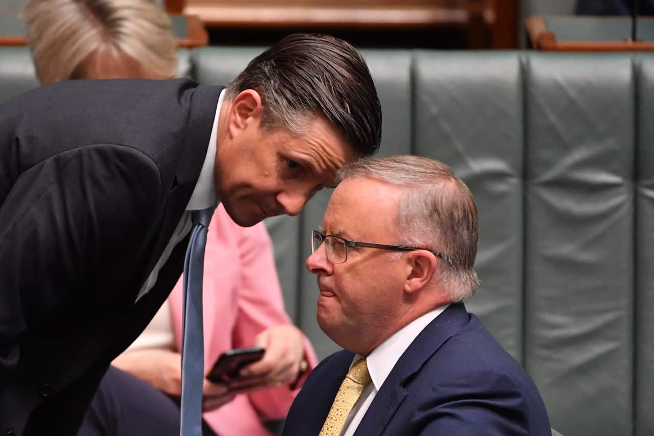 Mark Butler and Anthony Albanese during Question Time in House of Representatives at Parliament House in Canberra.