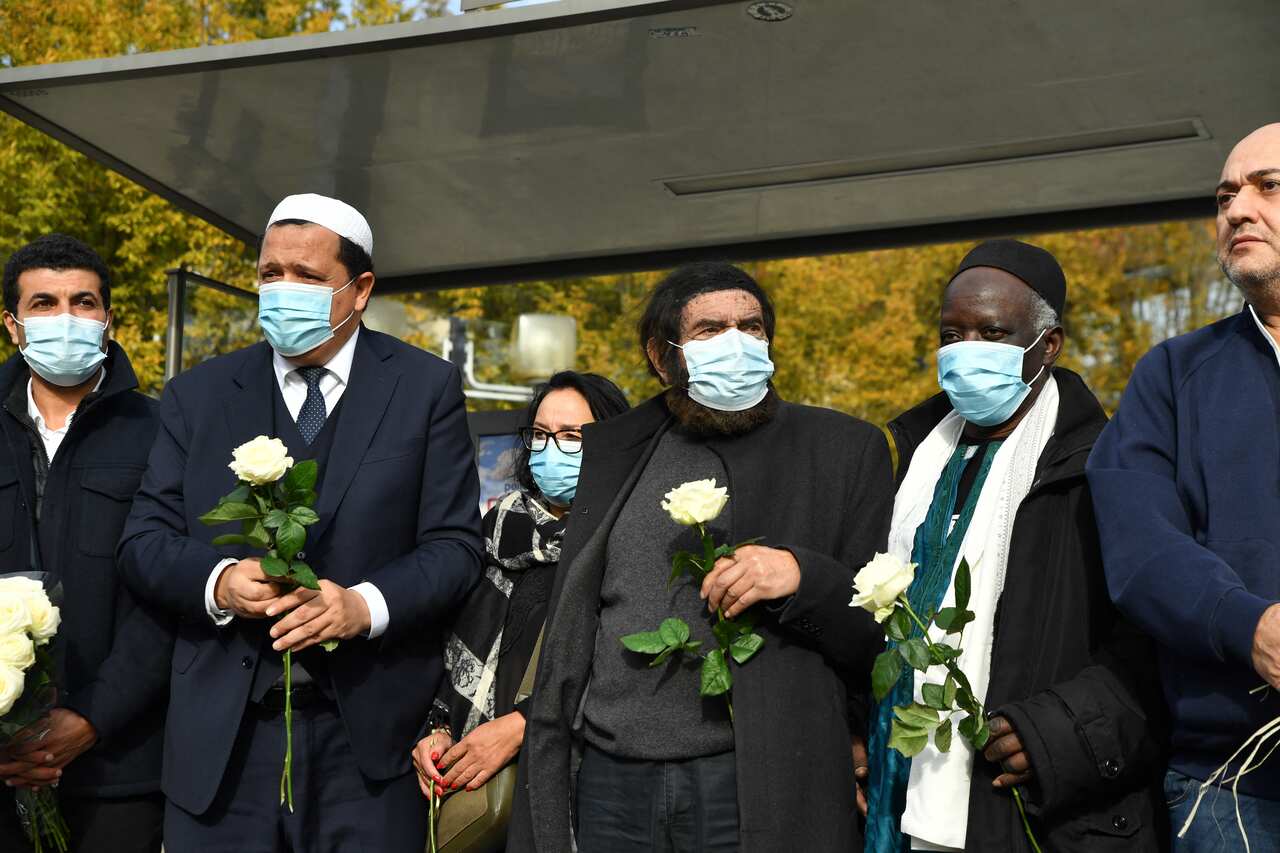 Imam of Drancy Hassen Chalghoumi and Jewish writer Marek Halter attending a gathering of imams outside the Bois d'Aulne secondary school outside Paris.