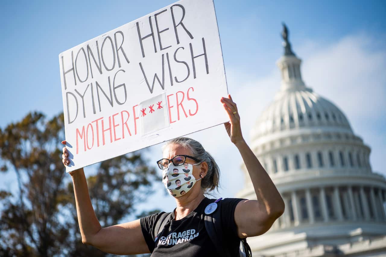A demonstrator on the East Front lawn of the Capitol on the day of the vote.