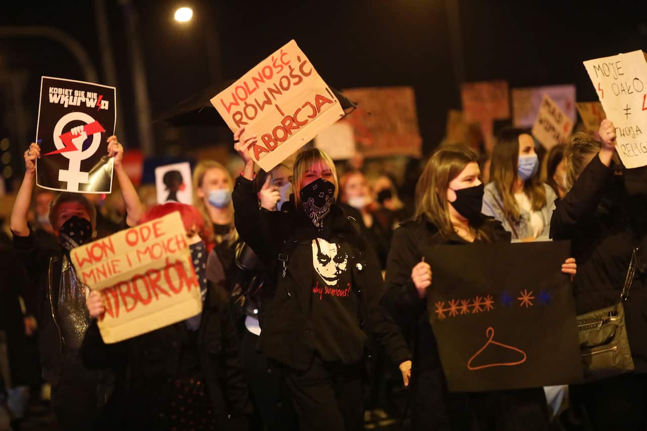 Protesters block the streets during a protest against the tightening of the abortion law in Plock, Poland, 26 October 2020.
