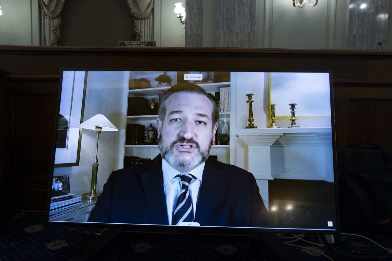 Republican Senator from Texas Ted Cruz appears on a monitor as he directs a line of questions toward CEO of Twitter Jack Dorsey during the Senate Commerce, Science, and Transportation Committee hearing.