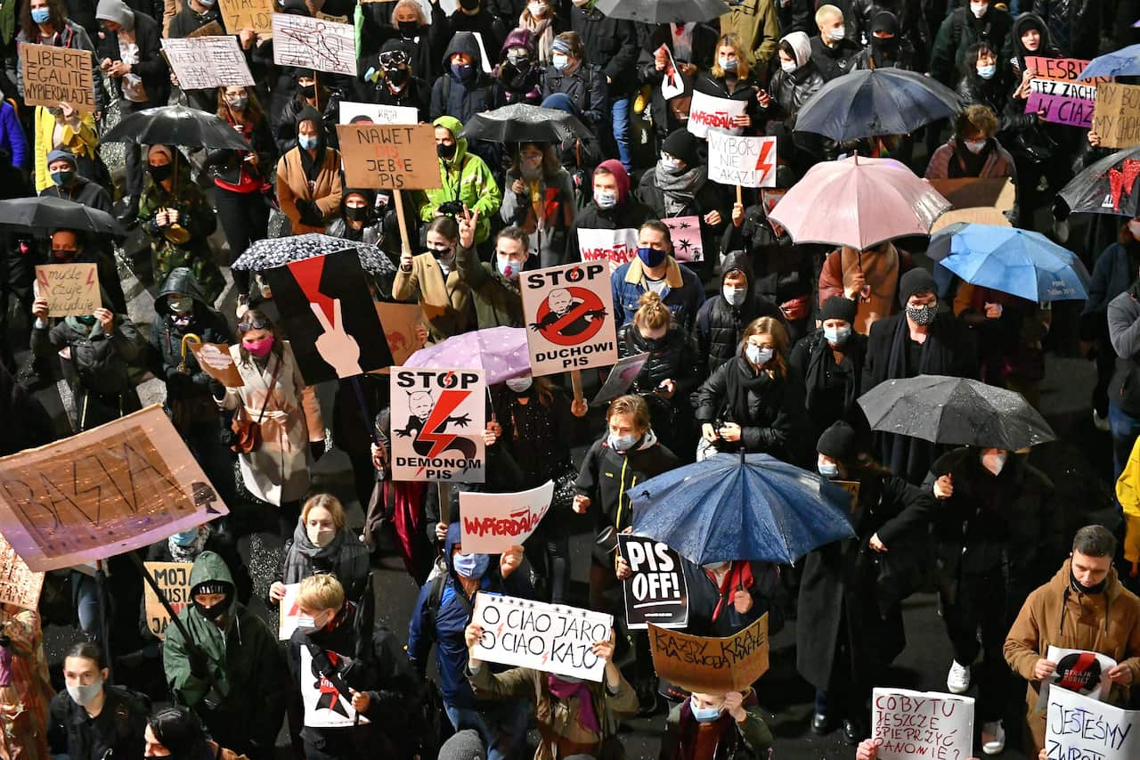 People take part in a protest against the tightening of the abortion law in Wroclaw, south-west Poland, 30 October 2020