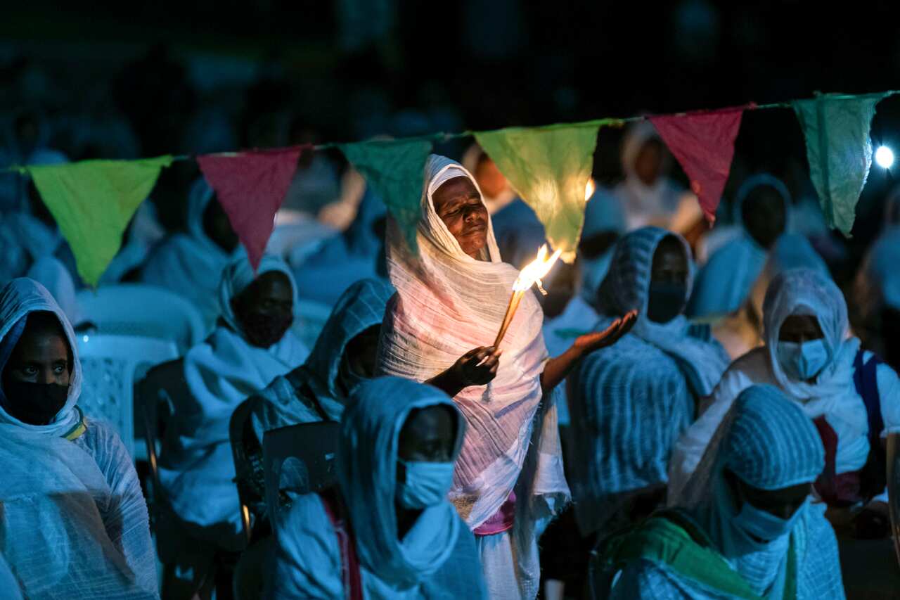 Ethiopian Orthodox Christians pray for peace during a church service at the Medhane Alem Cathedral in the Bole Medhanealem area of the capital Addis Ababa. 