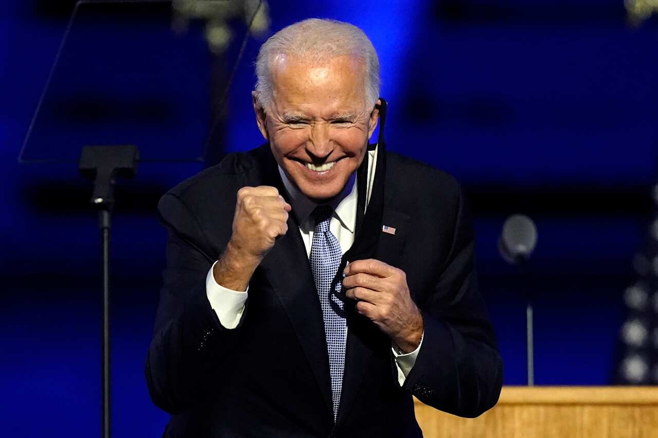President-elect Joe Biden gestures to supporters after declaring victory on Sunday.