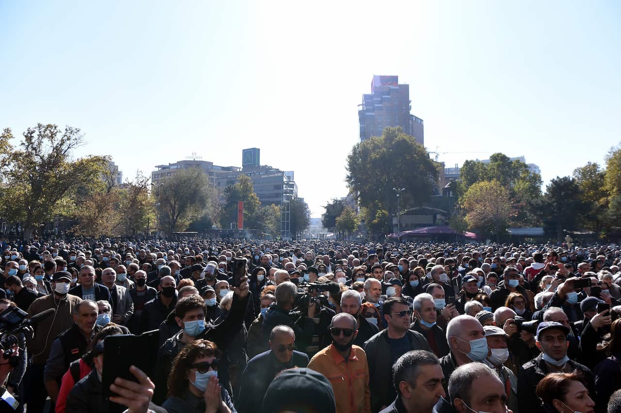 Armenian people attend a rally at the Freedom Square in Yerevan, Armenia, 11 November 2020.