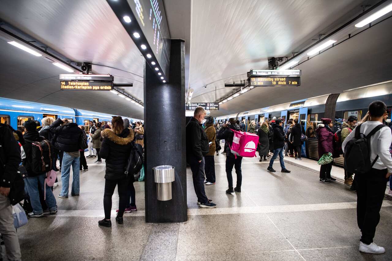 A file photo of commuters waiting to catch trains during rush hour at the Stockholm Central metro station, Sweden.