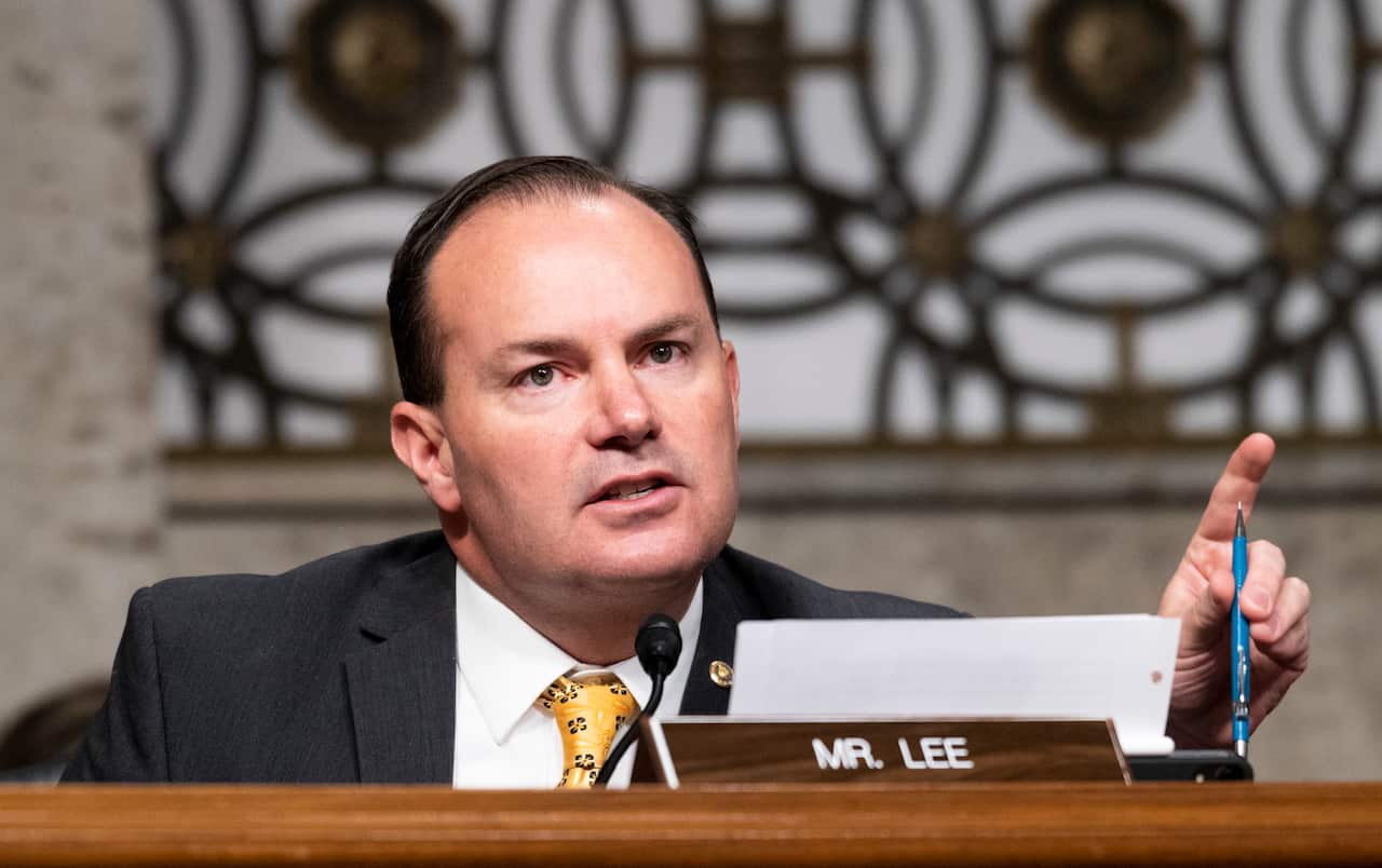 US Senator Mike Lee, questions Mark Zuckerberg, CEO of Facebook, and Jack Dorsey, CEO of Twitter, during a Senate Judiciary Committee