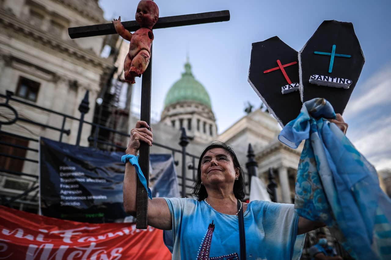 People participate in a demonstration against the Bill on Legal Abortion, in front of the National Congress, in Buenos Aires, Argentina. 