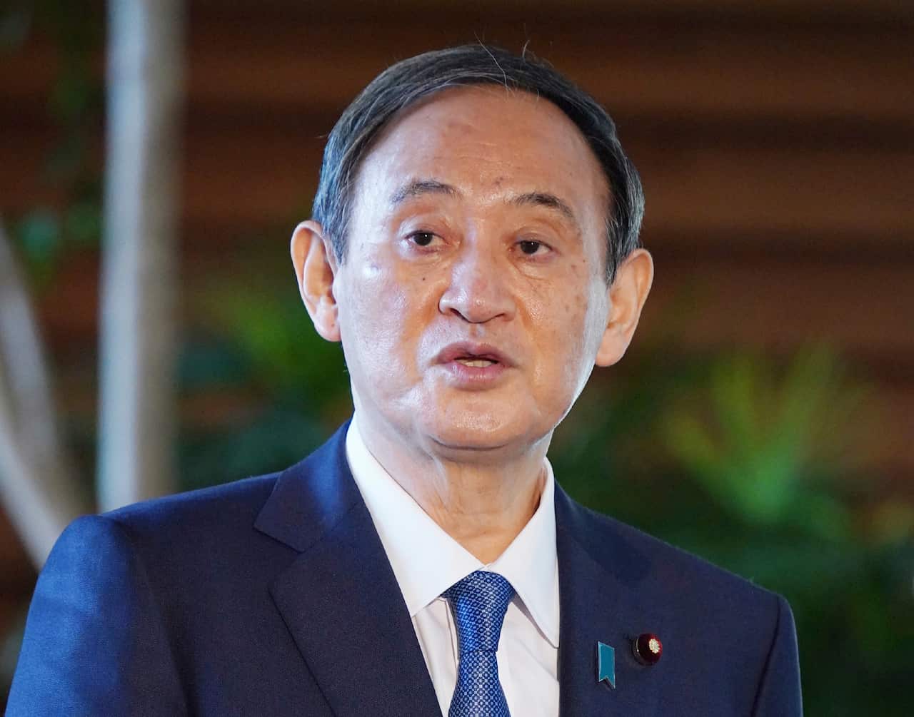 Japan's Prime Minister Yoshihide Suga speaks to media at Prime Minister's Office in Tokyo on Nov.12, 2020.