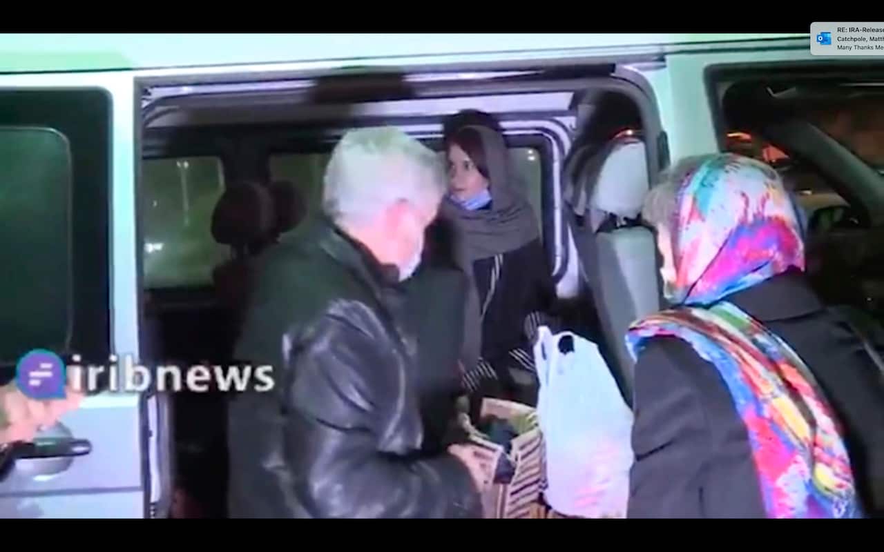 Kylie Moore-Gilbert, center inside van, is seen in Tehran, Iran.