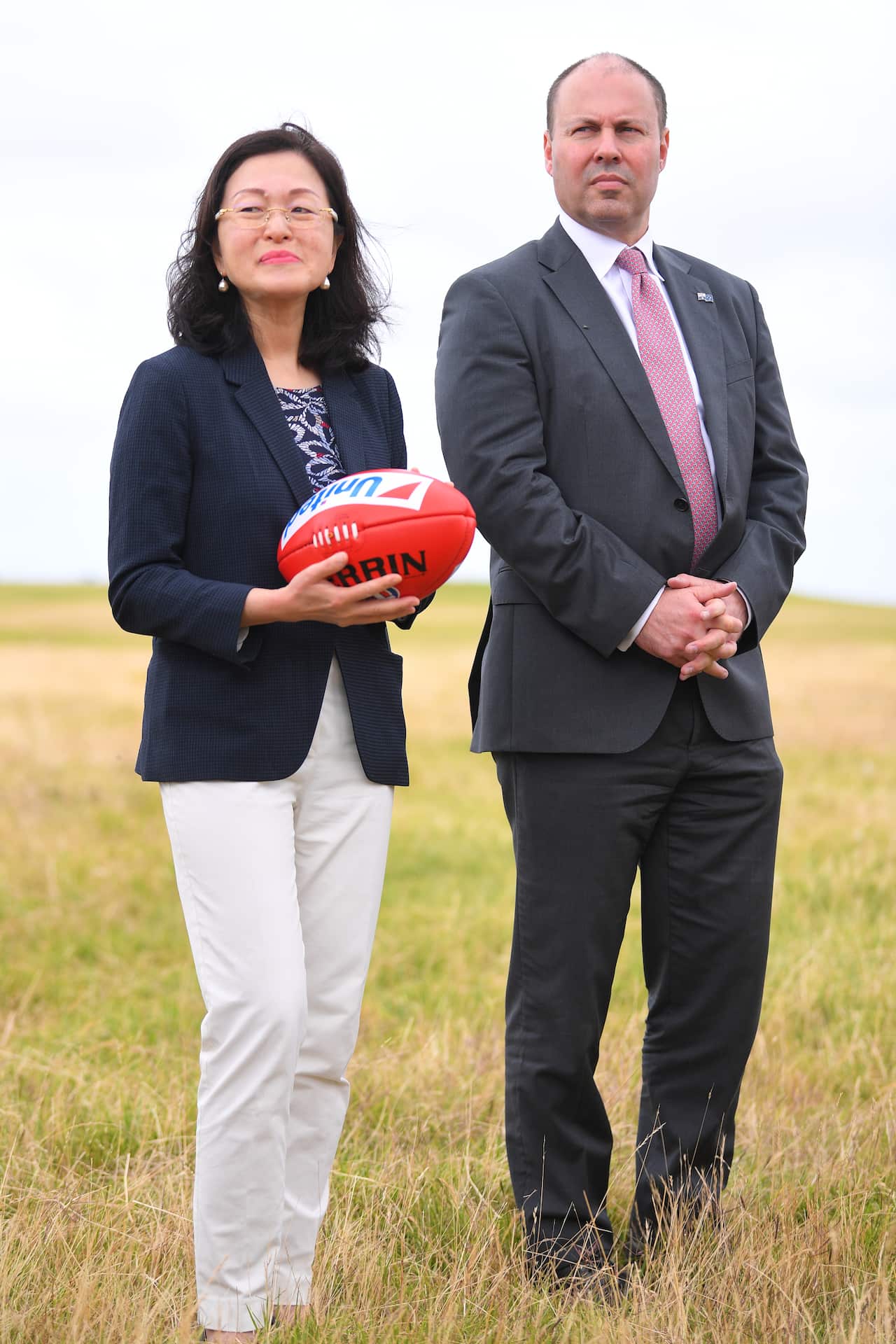 Liberal member for Chisholm Gladys Liu (left) and, Australian Treasurer Josh Frydenberg.
