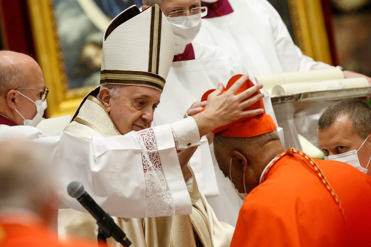 American newly Cardinal Wilton D Gregory receives his biretta as he is appointed cardinal by Pope Francis.