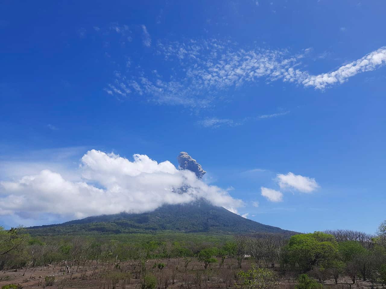 Mount Ili Lewotolok spews hot volcanic ash into the air during an eruption in Lembata, East Nusa Tenggara, Indonesia.
