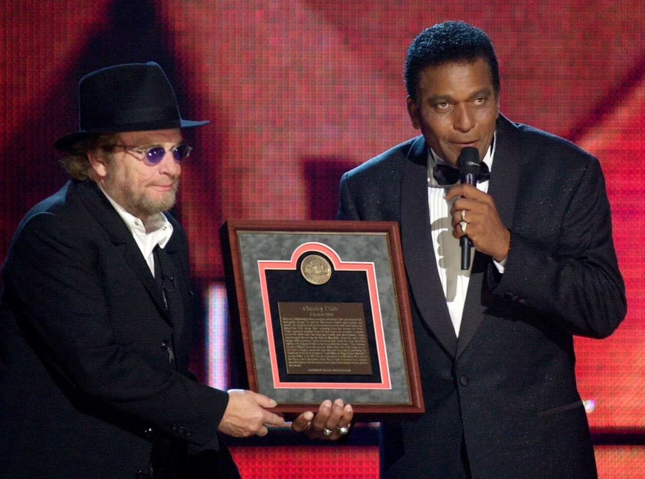 Charley Pride, right, receives his Country Music Hall of Fame plaque in October 2000.