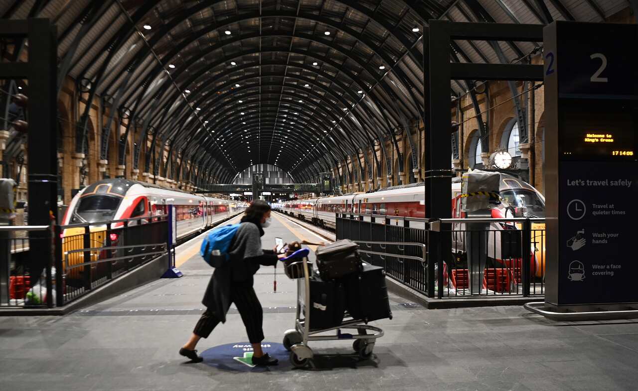 A commuter at Kings Cross train station in London, Britain.