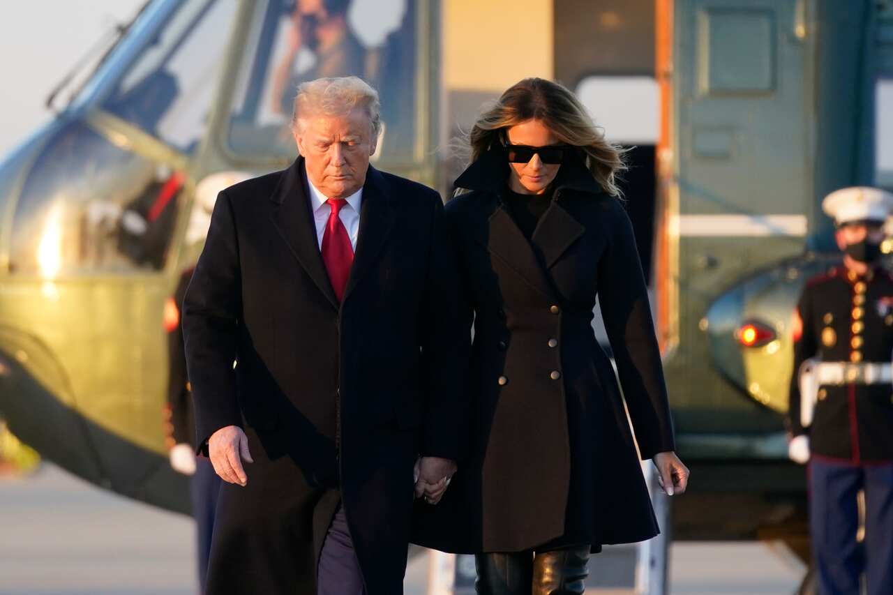 President Donald Trump and first lady Melania Trump board Air Force One at Andrews Air Force Base, 23 December, 2020. 