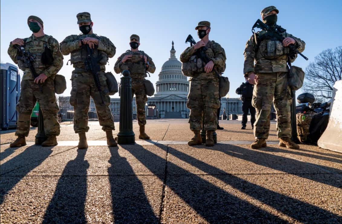Members of the National Guard stand at the East Front of the US Capitol in Washington, DC, USA, 3 March 2021
