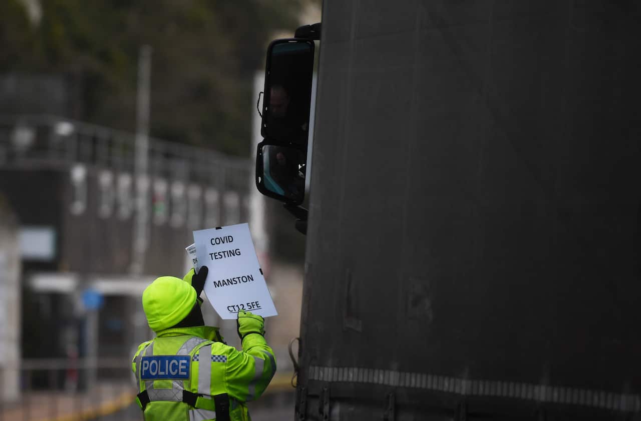 Police check documents as lorries arrive at the port of Dover in Britain on 1 January, 2021. 