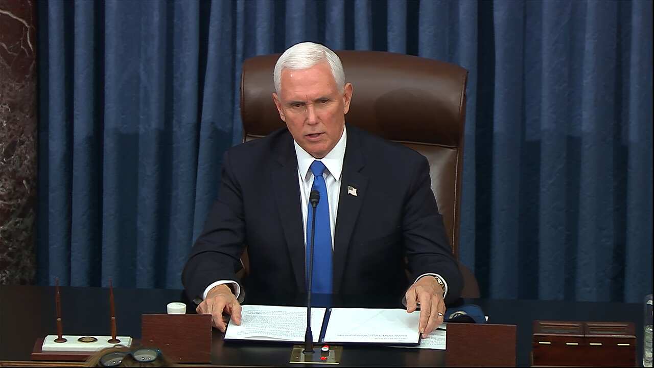 In this image from video, Vice President Mike Pence speaks as the Senate reconvenes after protesters stormed into the US Capitol on Wednesday, 6 January.