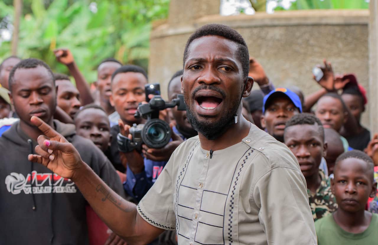 Bobi Wine said security forces had breached the fence around his house and he felt under 'siege'.