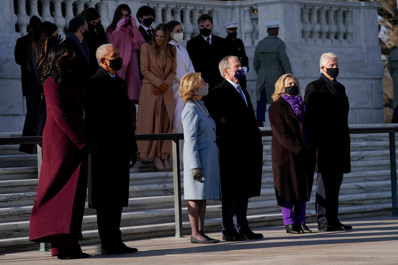 Barack and Michelle Obama (left), George W. and Laura Bush (centre) and Bill and Hillary Clinton at Arlington Cemetery.