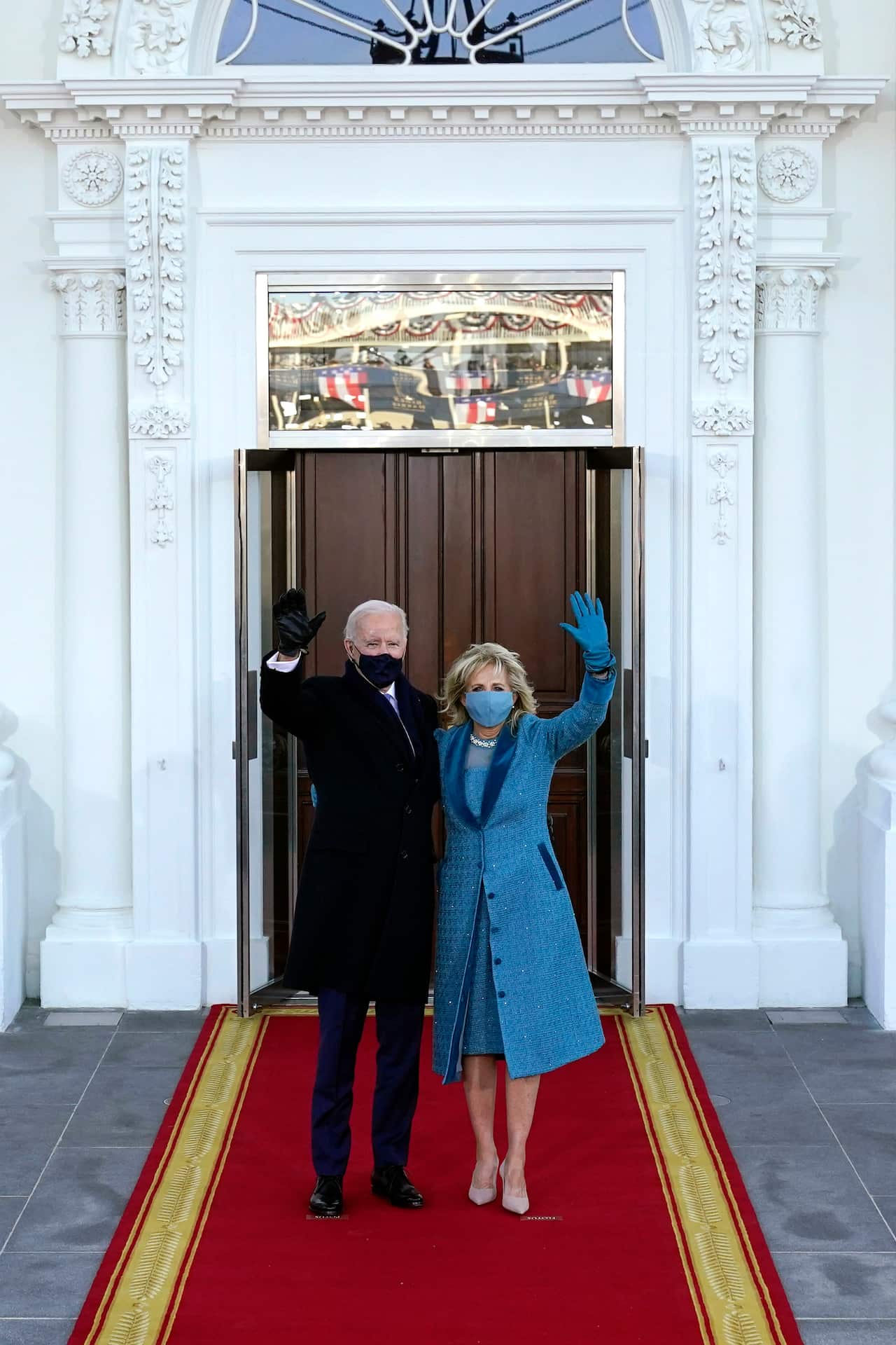 President Joe Biden and First Lady Jill Biden arrive at the North Portico of the White House.