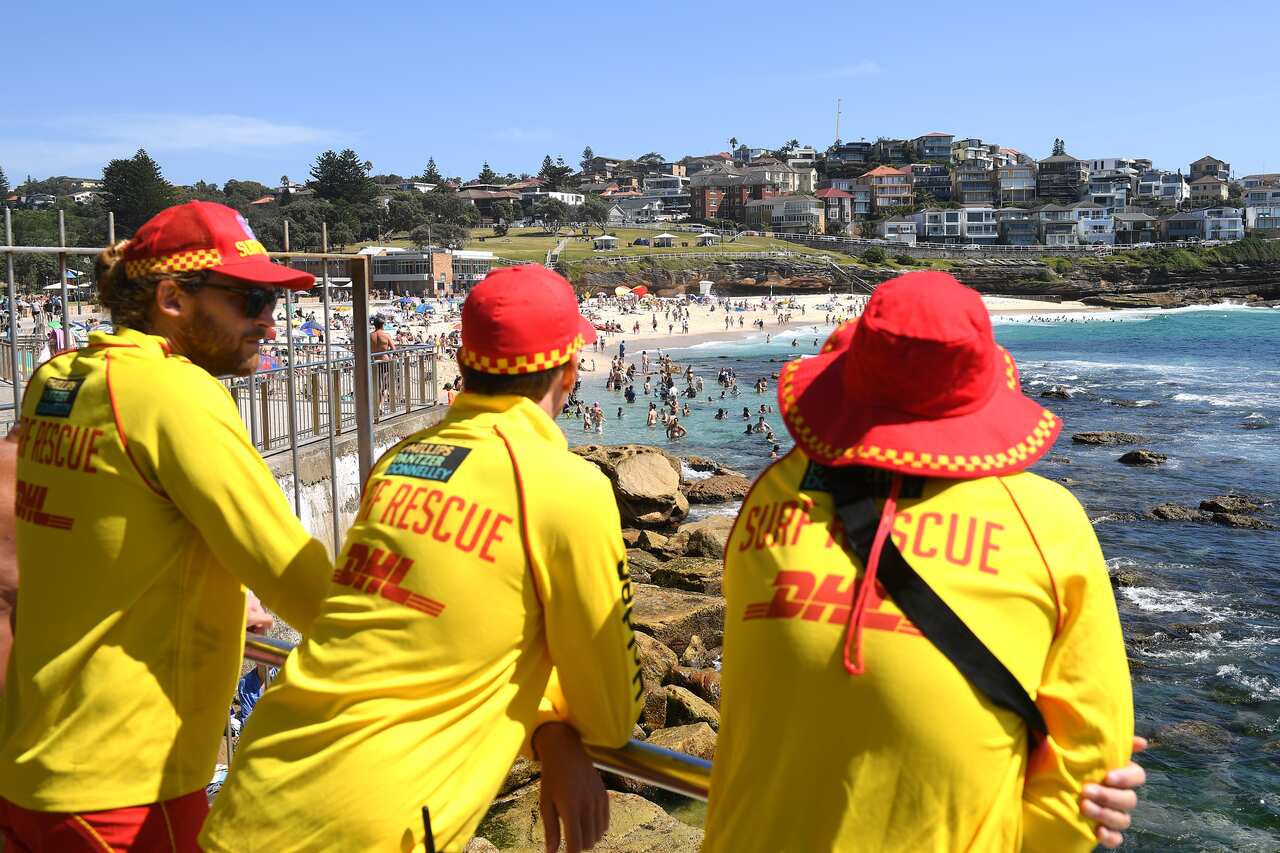 Surf Lifesavers watch on at Bronte beach in Sydney.
