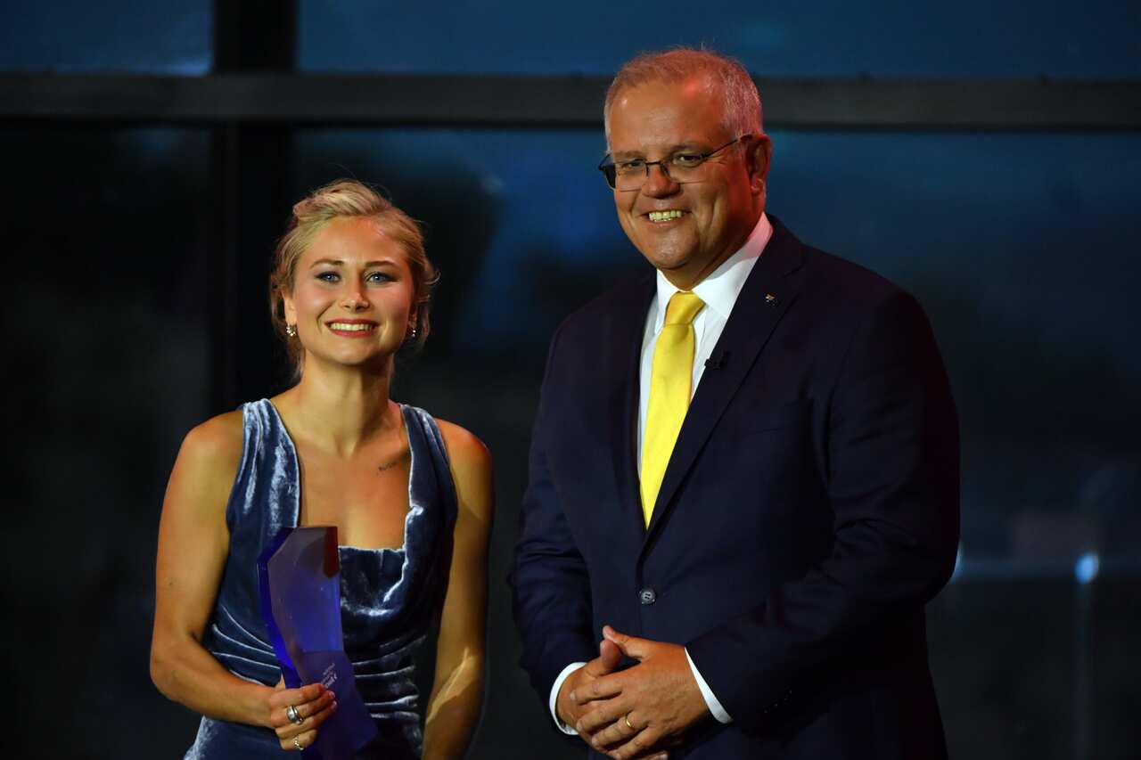 Prime Minister Scott Morrison and 2021 Australian of the Year winner Grace Tame during the 2021 Australian of the Year Awards at the National Arboretum in Canberra, Monday, January 25, 2021. (AAP Image/Mick Tsikas) NO ARCHIVING