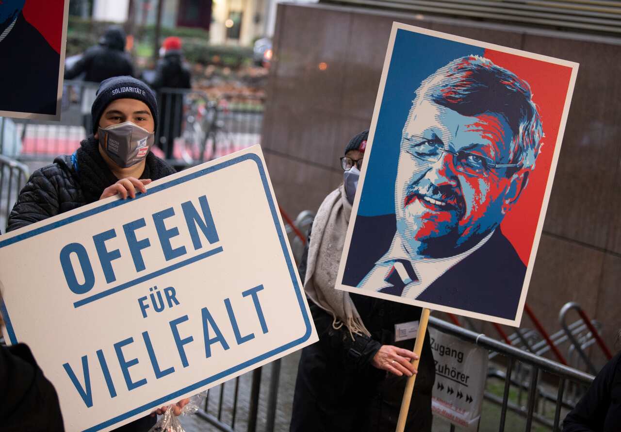 A demonstration in front of the district court ahead of the announcement of the verdict in the murder trial of Walter Luebcke.