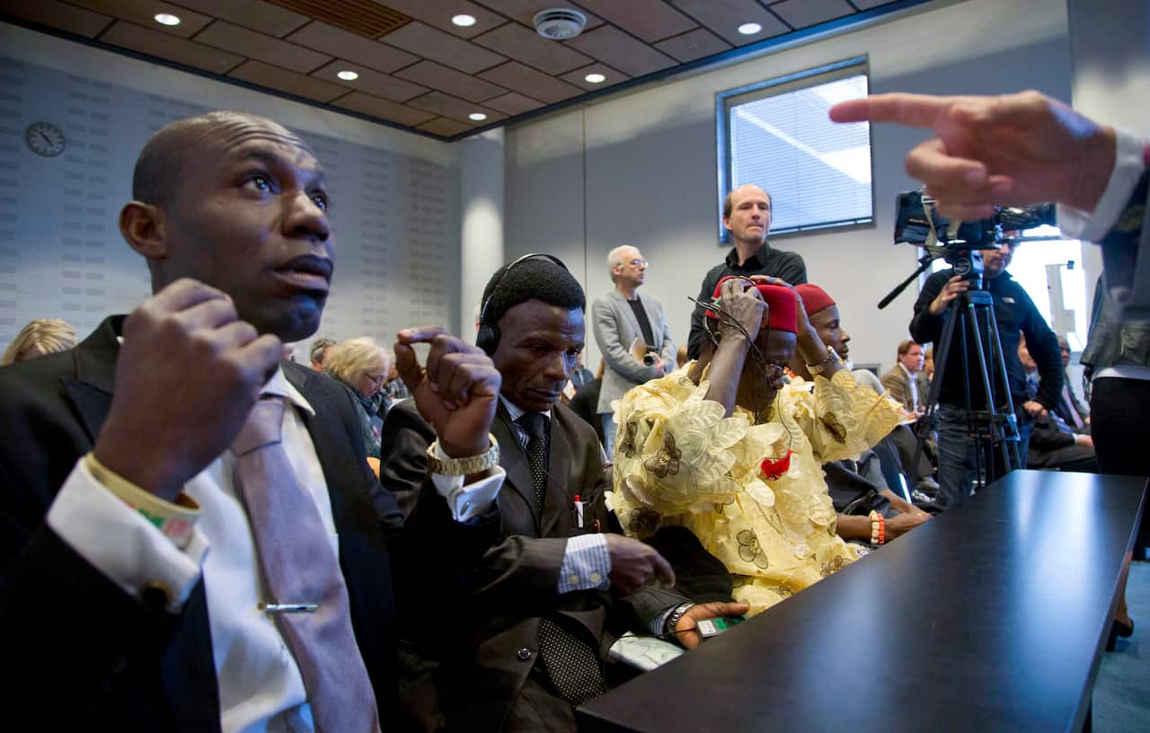 Plaintiffs Alali Efanga, Friday Alfrad Akpan, Chief Fidelis A Oguru and Eric Dooh at a court case of Nigerian farmers against Shell, in The Hague in 2012.