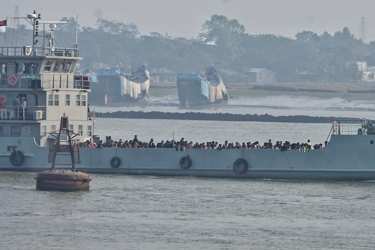 Rohingya refugees travel on a naval vessel to be relocated to to the island of Bhasan Char, in Chattogram, Bangladesh, on 30 January, 2021