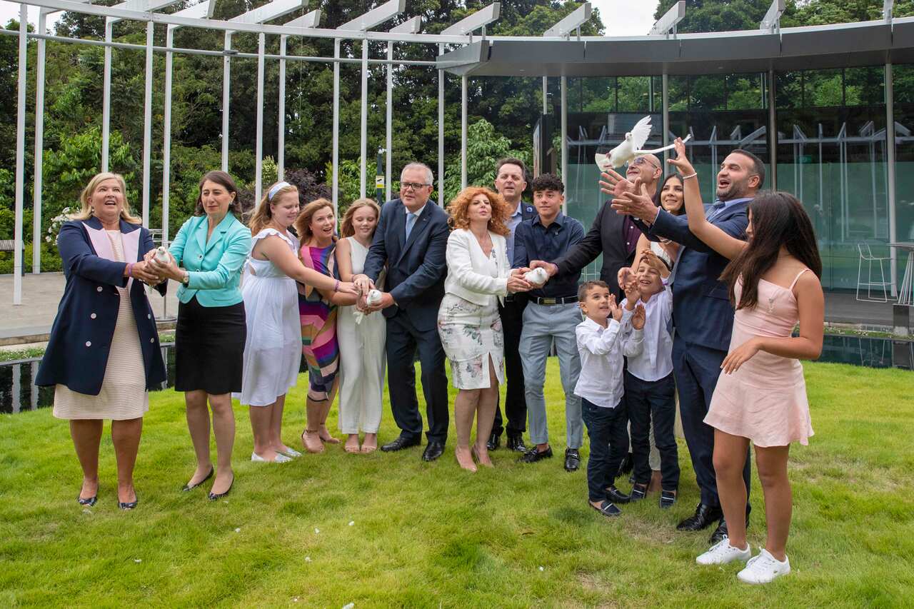 Prime minister Scott Morrison, NSW Premier Gladys Berejiklian and family release doves in honour of children killed a year ago during the launch of i4give Day 
