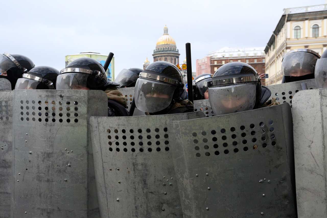 Police blocking access to a street during a protest against the jailing of opposition leader Alexei Navalny in St. Petersburg, Russia,  31 January, 2021. 