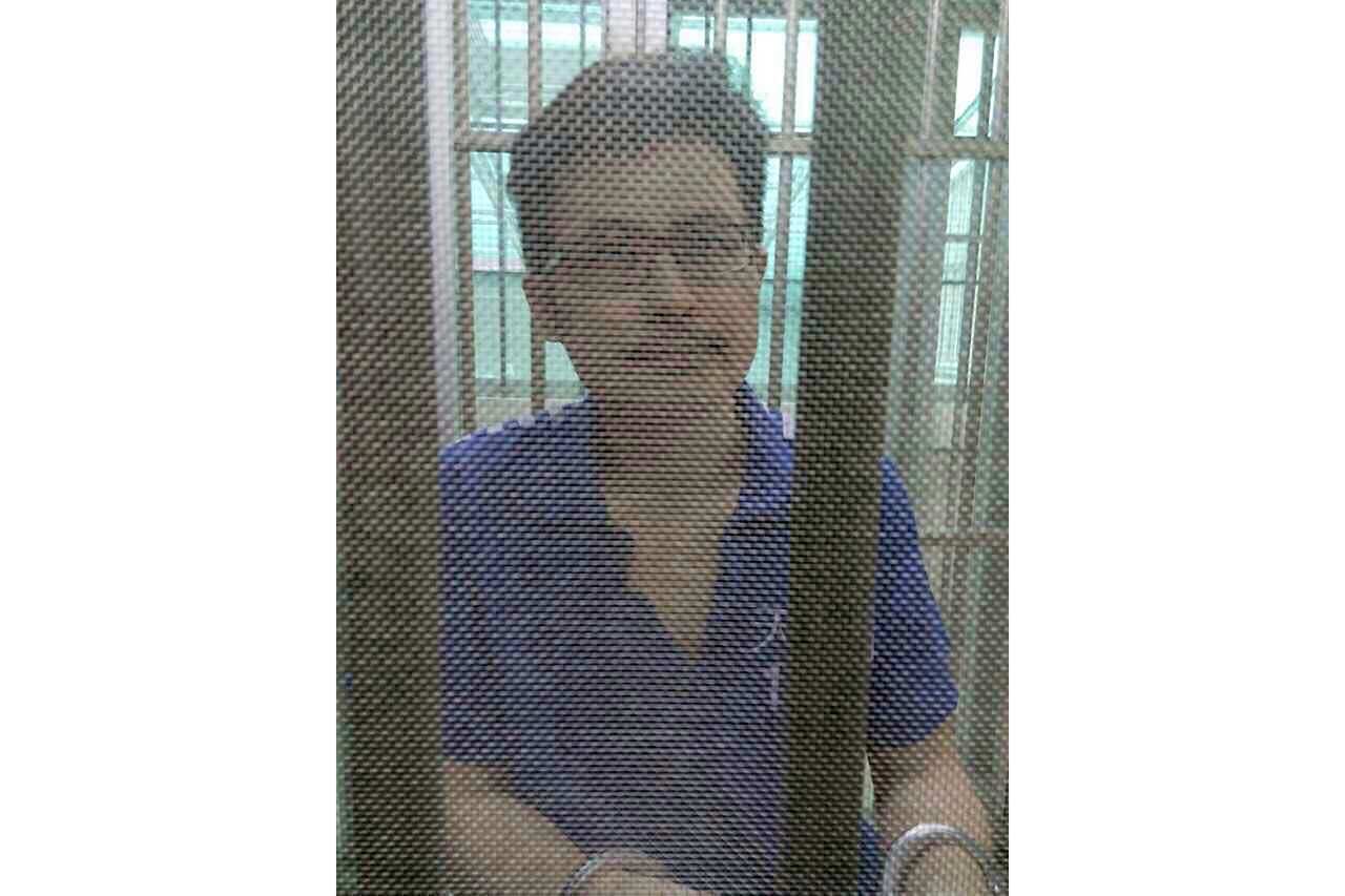 In this December 2014 file photo, Yang Maodon sits in a detention centre in Guangzhou in southern China's Guangdong province. 
