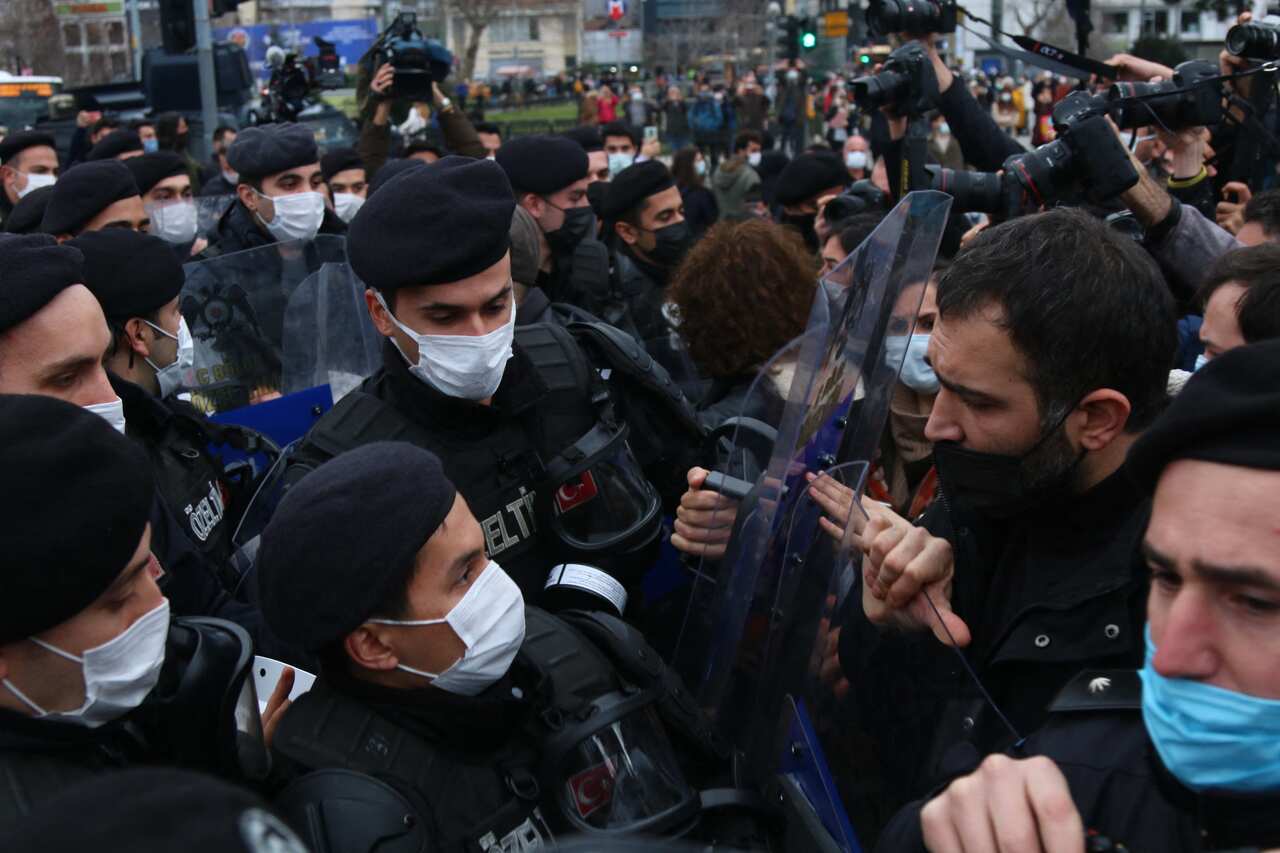 Thousands of riot police used rubber bullets, tear gas and batons on Tuesday