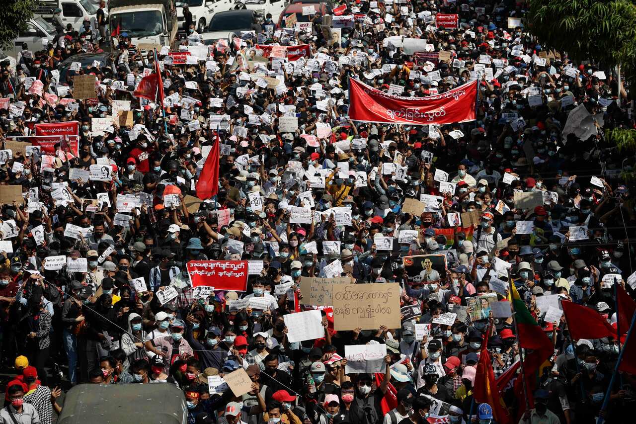 Demonstrators take part in a mass protest against the military coup in Yangon, Myanmar.