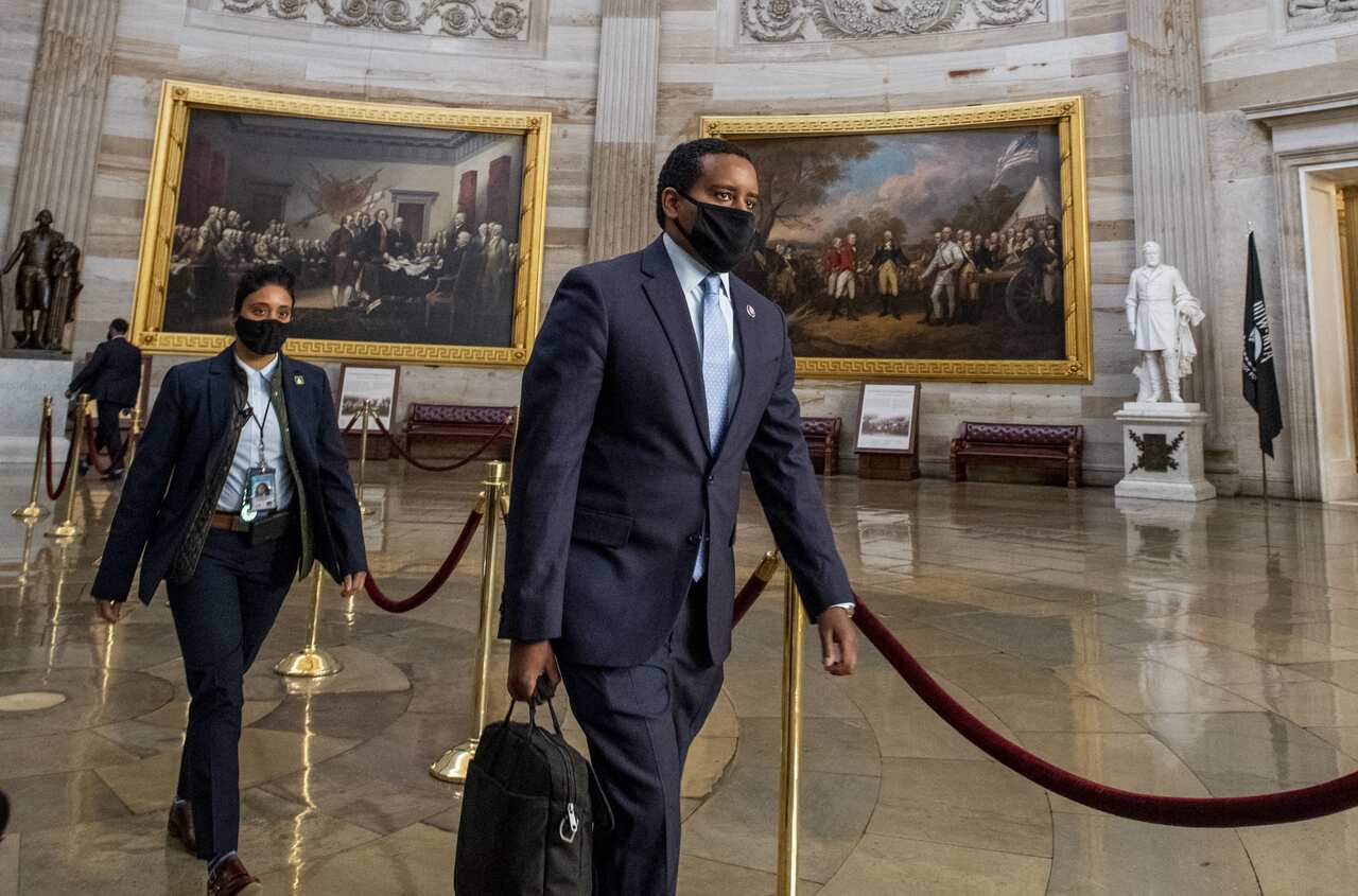 House impeachment manager Joe Neguse walks to the Senate chamber to begin the second day of the Senate impeachment trial of Donald Trump on Wednesday.