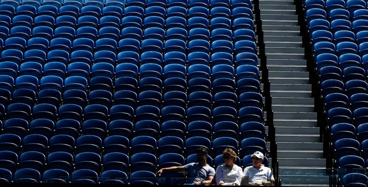 Spectators watch the third round match between United States' Serena Williams and Russia's Anastasia Potapova at the Australian Open tennis championship in Melbourne, Australia, Friday, Feb. 12, 2021.(AP Photo/Andy Brownbill)