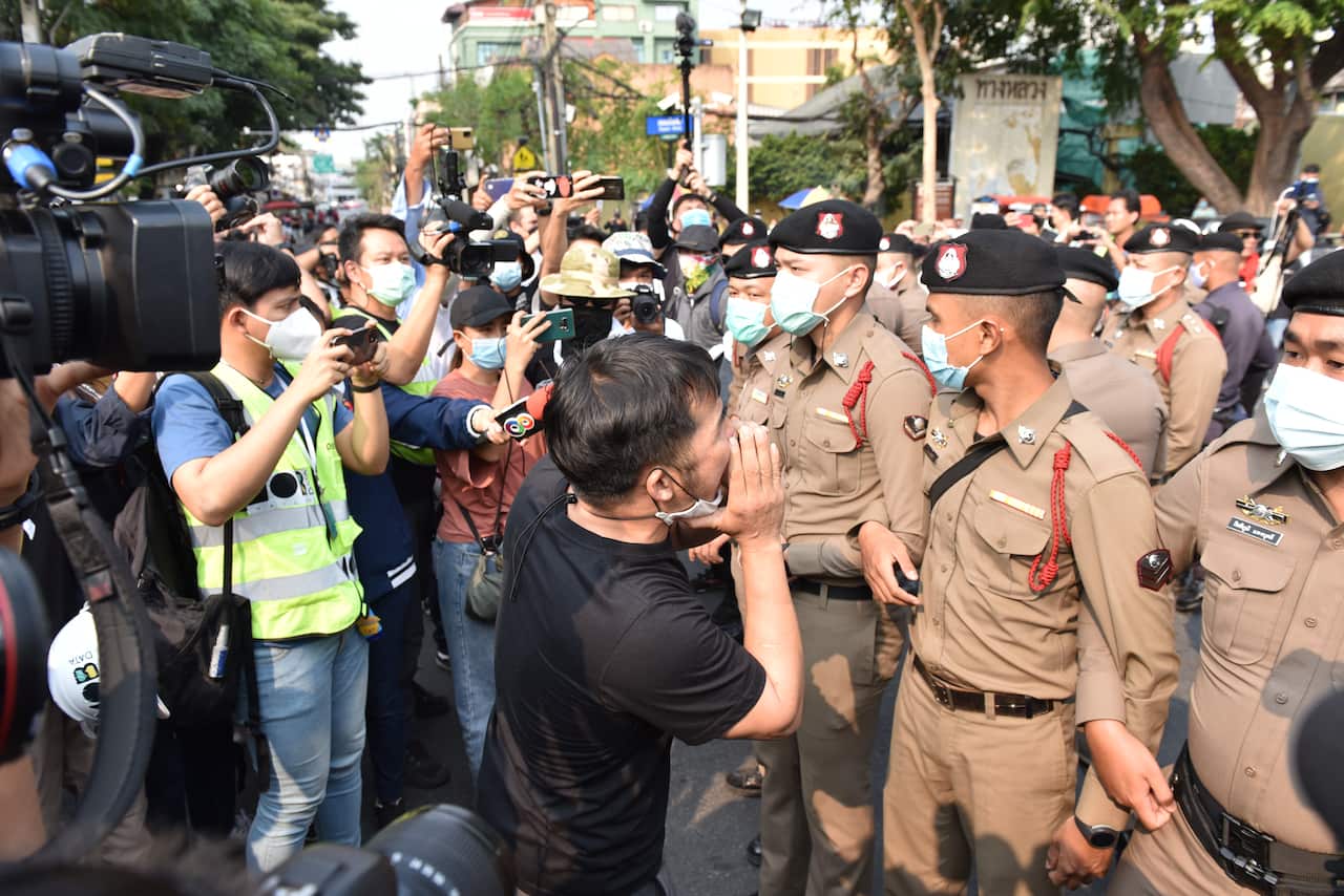 Police confront anti-government protesters in Bangkok