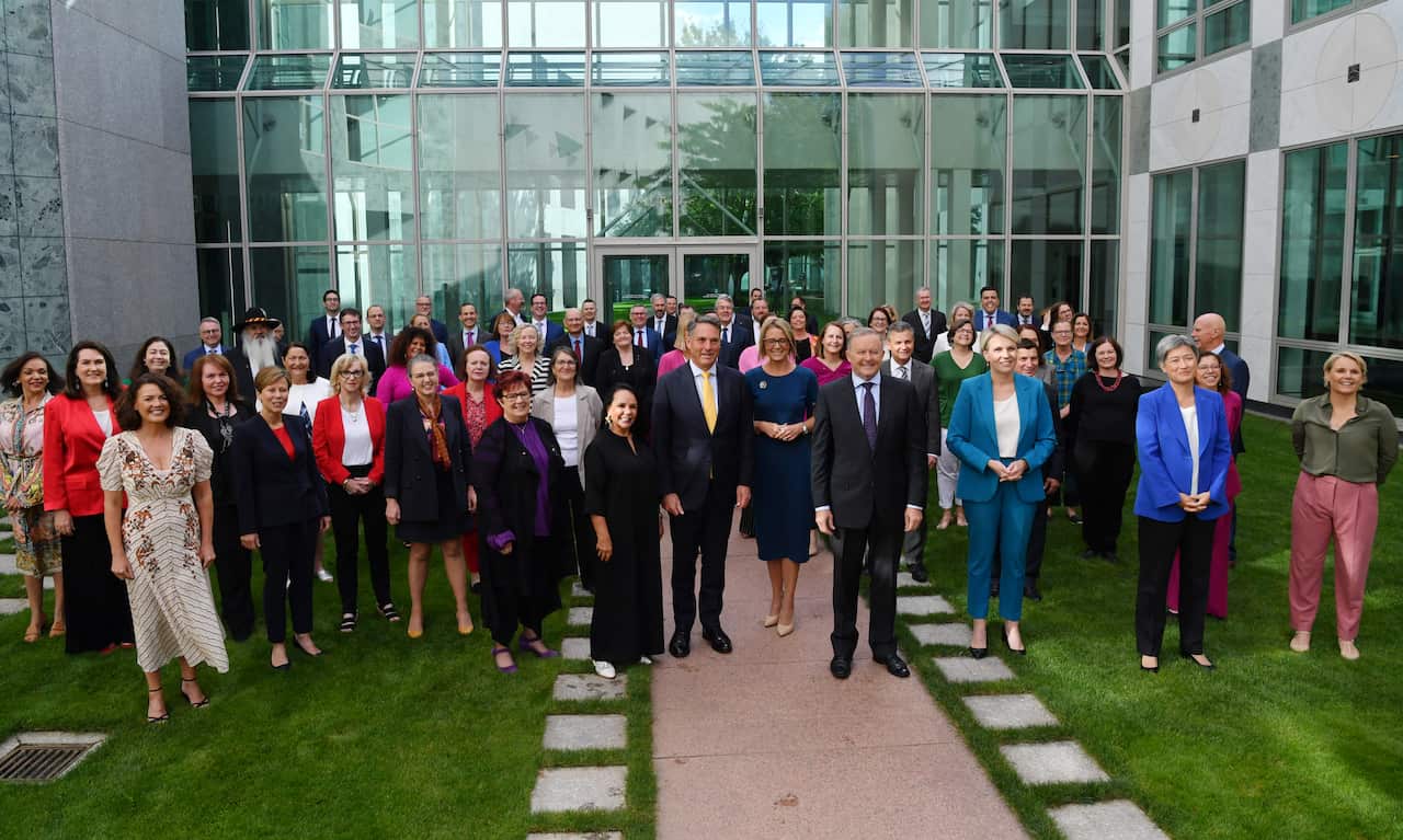 Anthony Albanese with members of the Labor caucus pose for a photograph on International Women's Day at Parliament House, Wednesday, February 24, 2021.