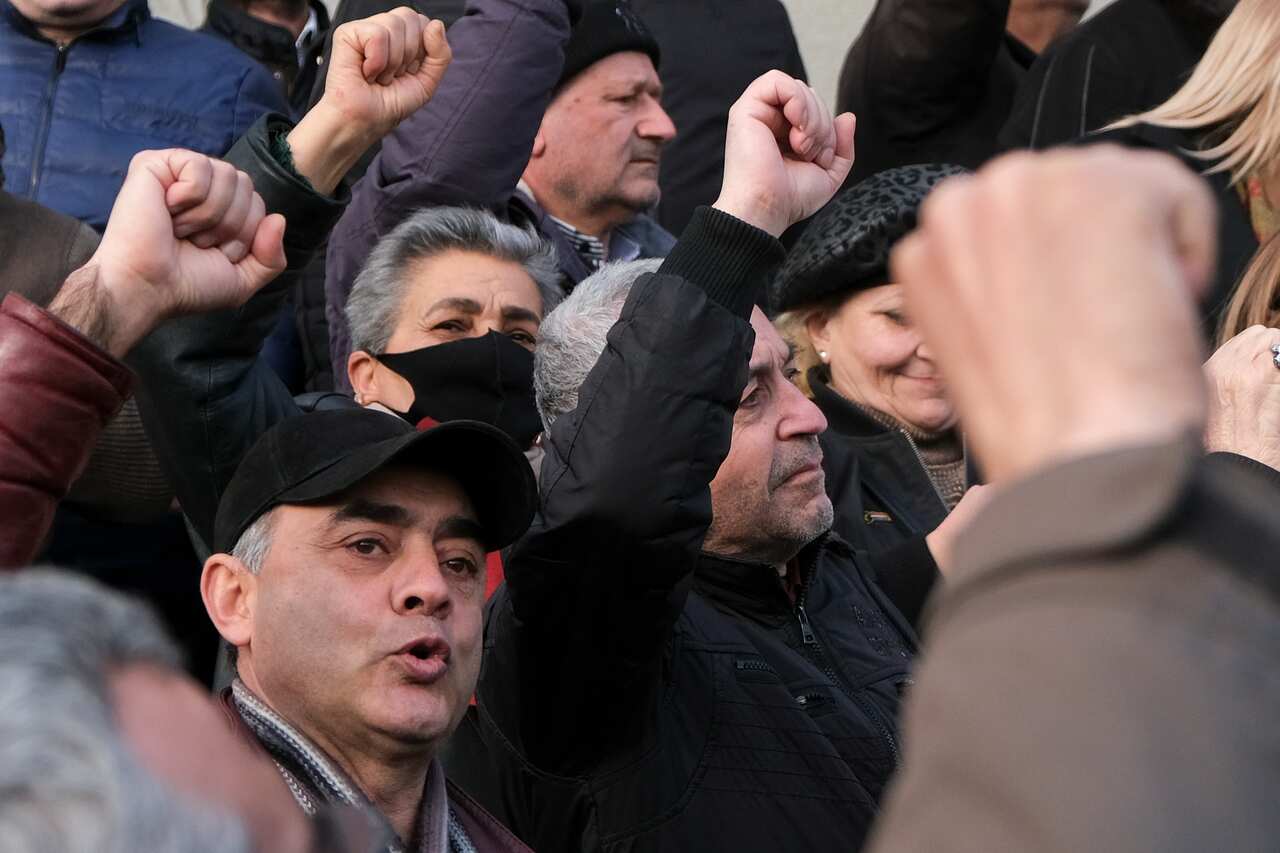 Opposition demonstrators shout anti-government slogans as they rally to pressure Armenian Prime Minister Nikol Pashinyan to resign in Yerevan, Armenia.