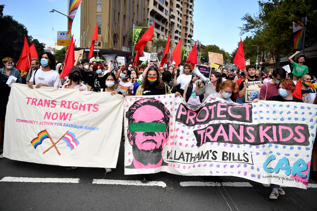Protesters march in Sydney ahead of the official Mardi Gras parade on Saturday. 